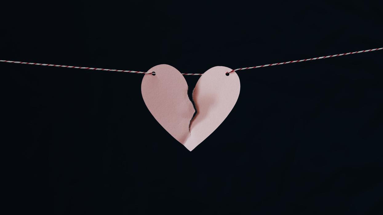 Paper heart ripped in two