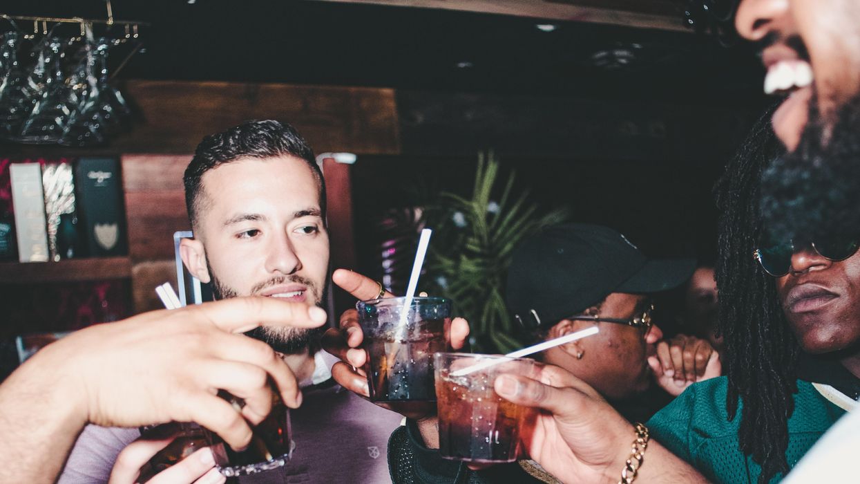 People drinking at a party.