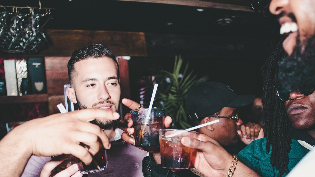 People drinking at a party.