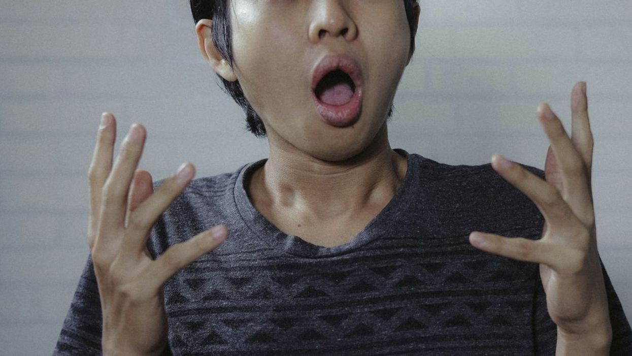 Person appearing shocked