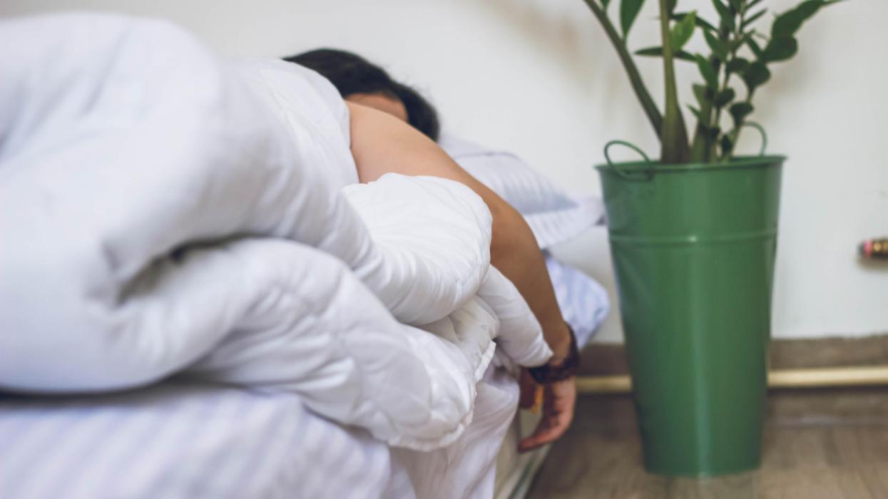 Person asleep in bed