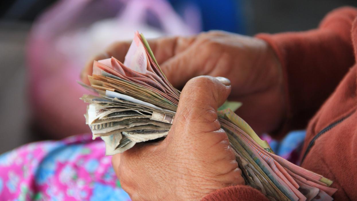 Person counting cash