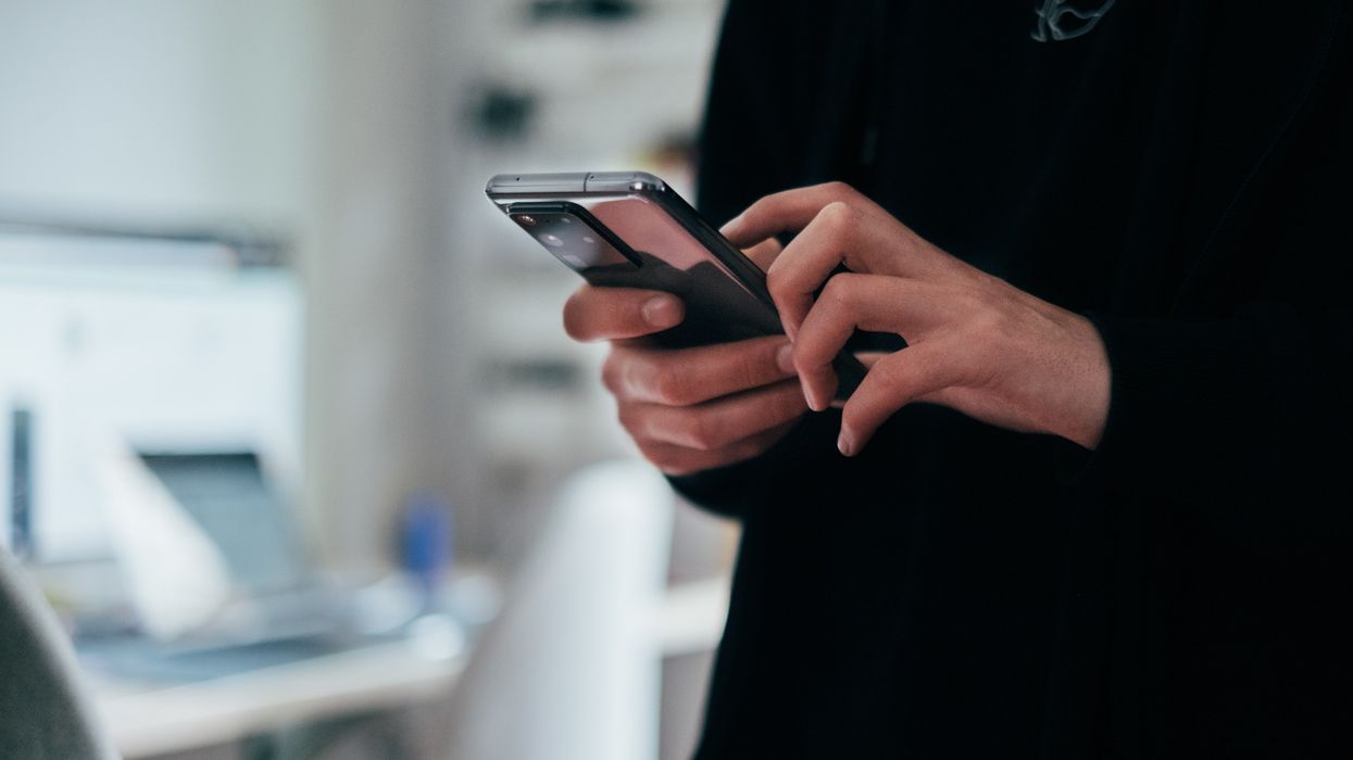 person holding smart phone