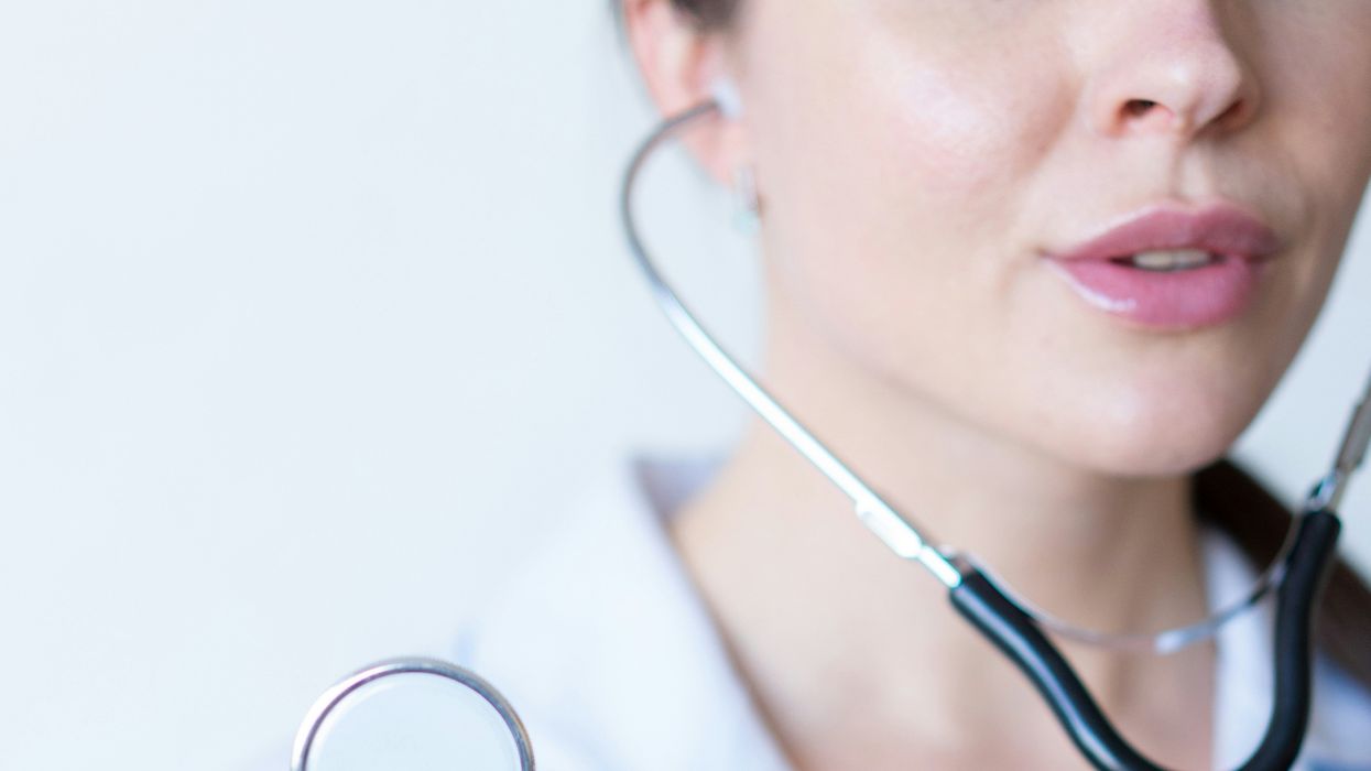 person holding stethoscope
