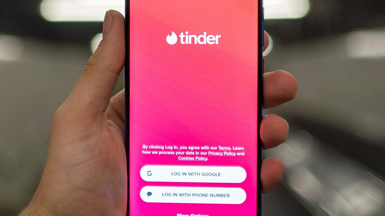 Person logging into a dating app