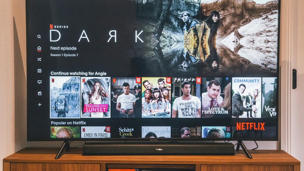 Person scrolling through TV shows on Netflix