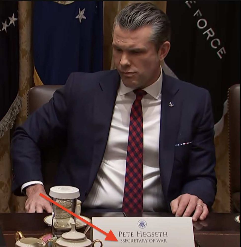 Pete Hegseth and his placard during Cabinet meeting