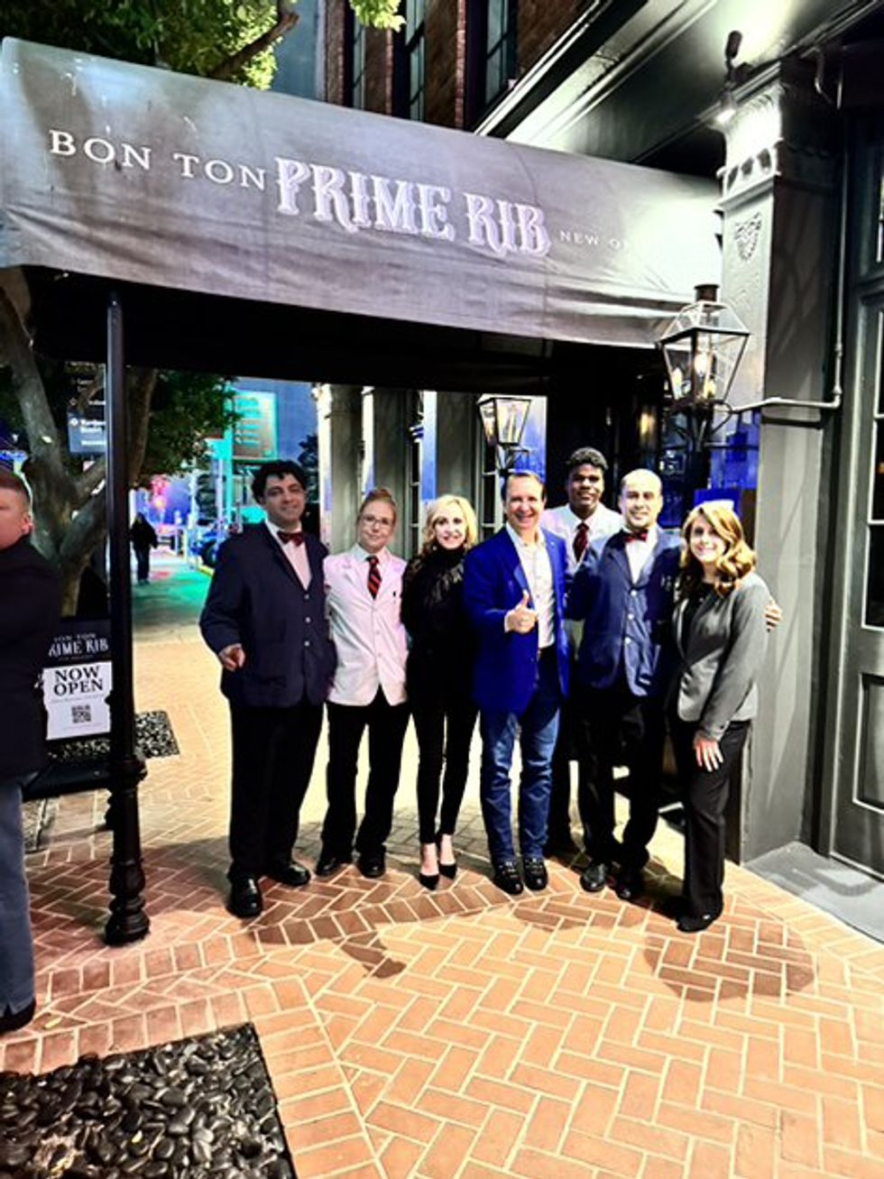 Photo of Jeff Landry and friends outside New Orleans steakhouse