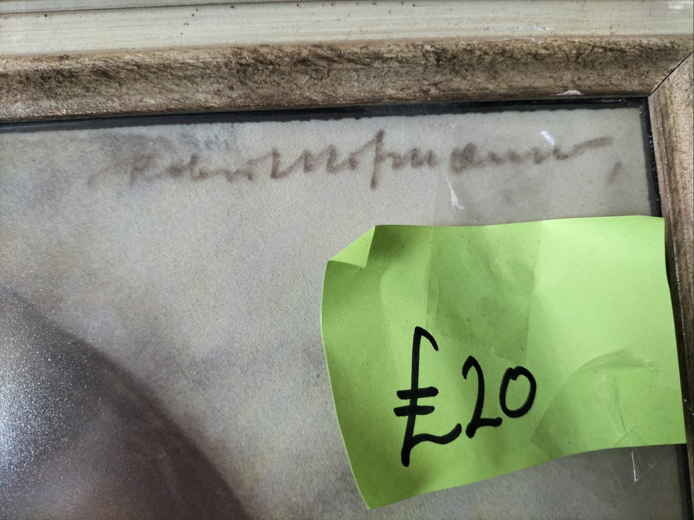 Photo of the corner of the painting with the \u00a320 price tag