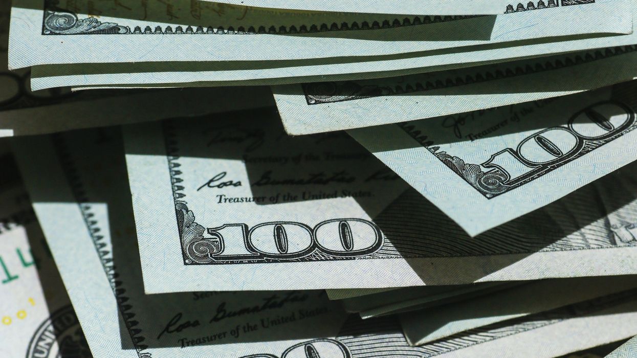 Pile of hundred dollar bills