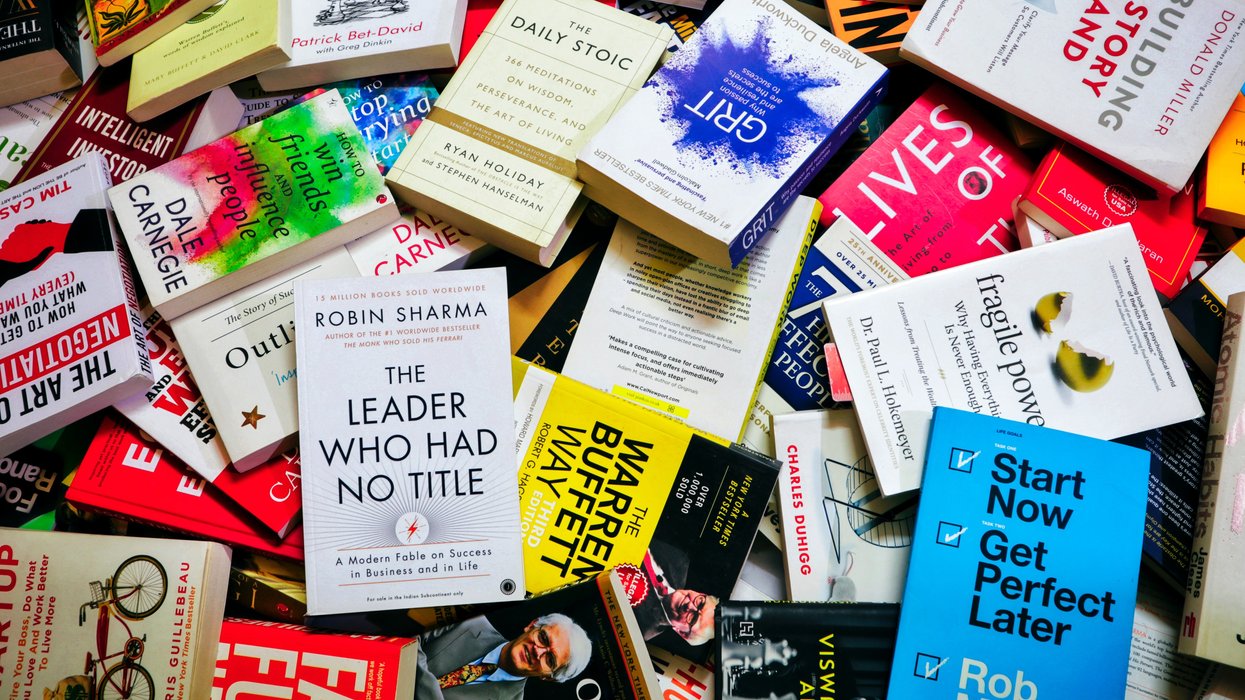 Pile of self-improvement and leadership books