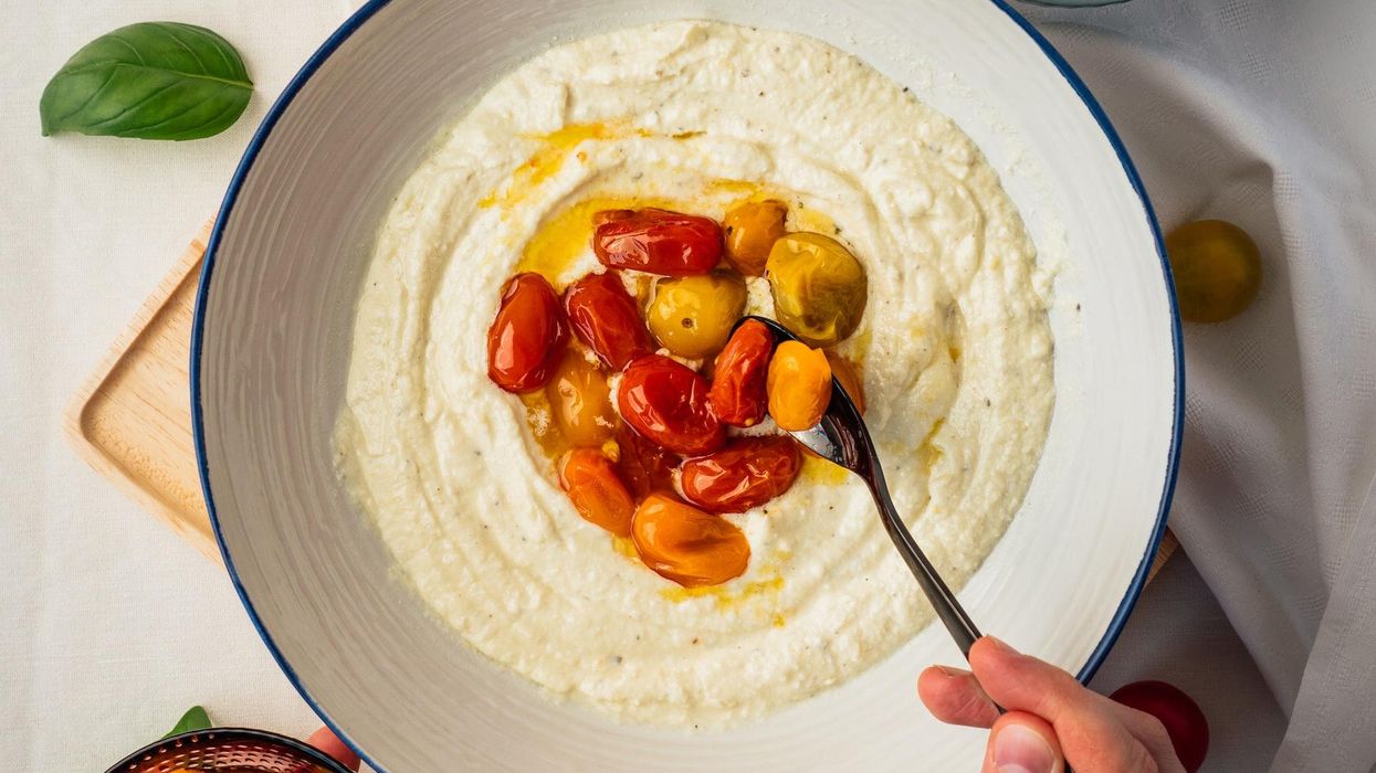 polenta topped with peppers in olive oil