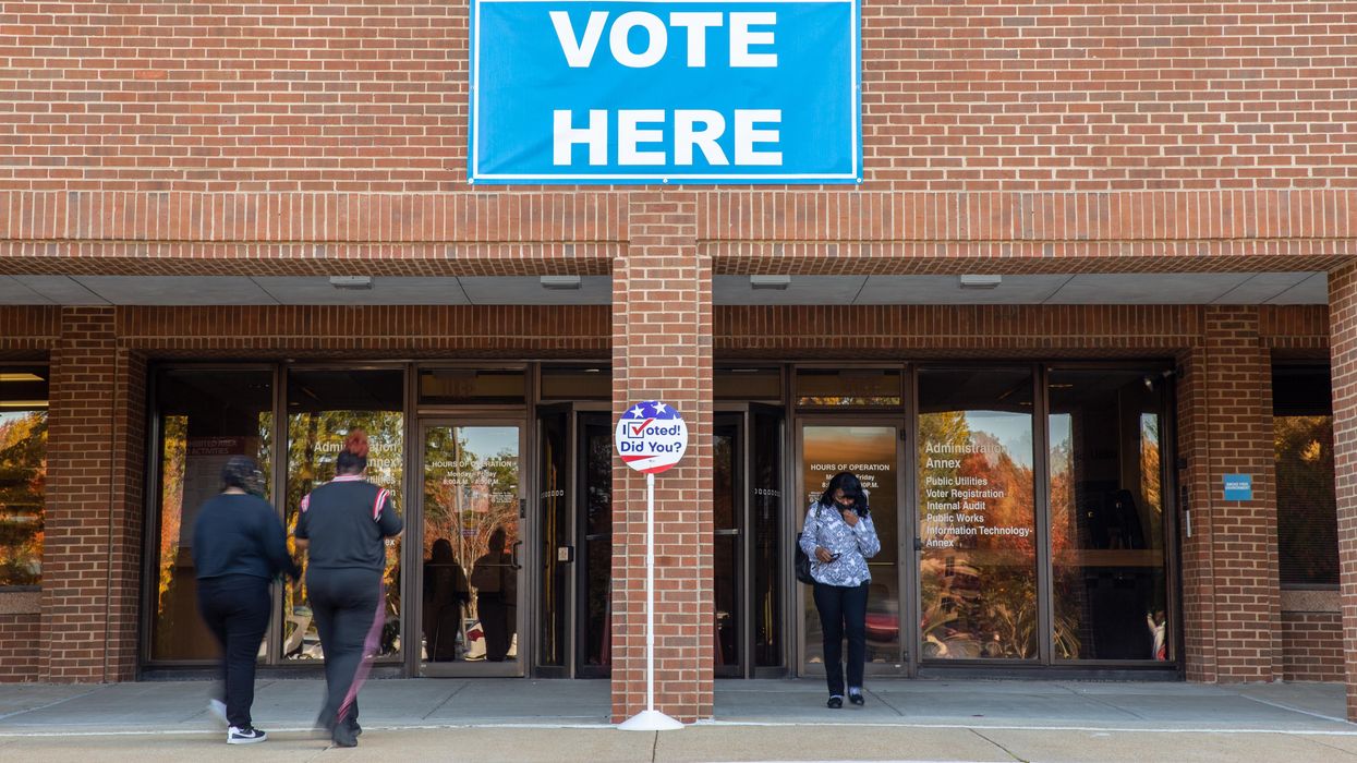 polling place with people entering and leaving