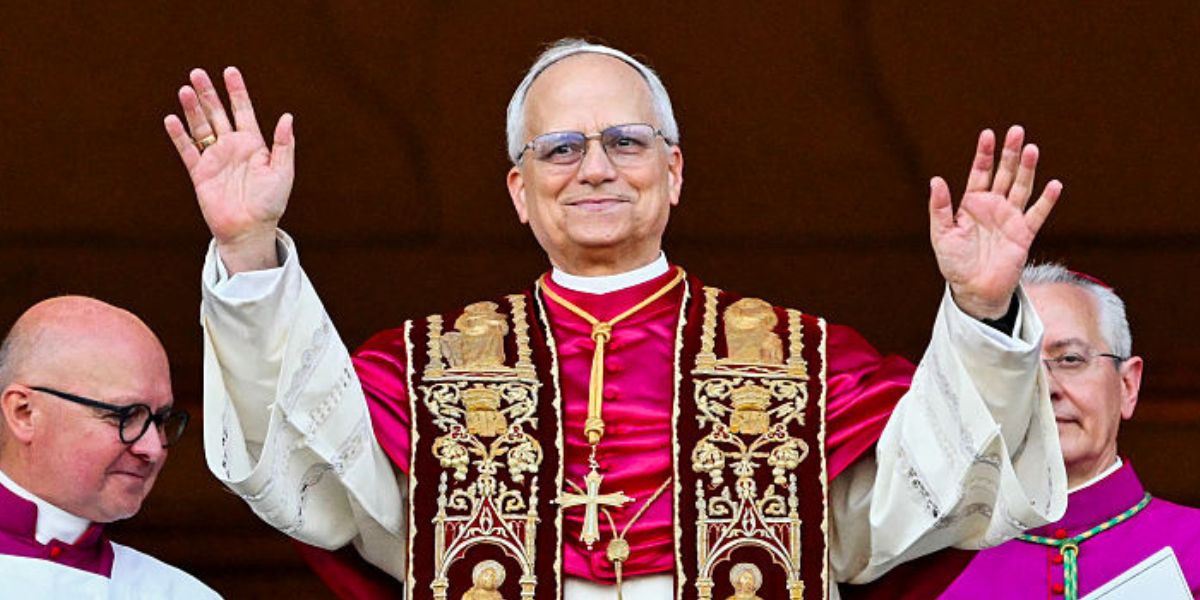 Photo Of Pope Leo Holding A Baseball Bat On An Airplane Sparks Hilarious Memes