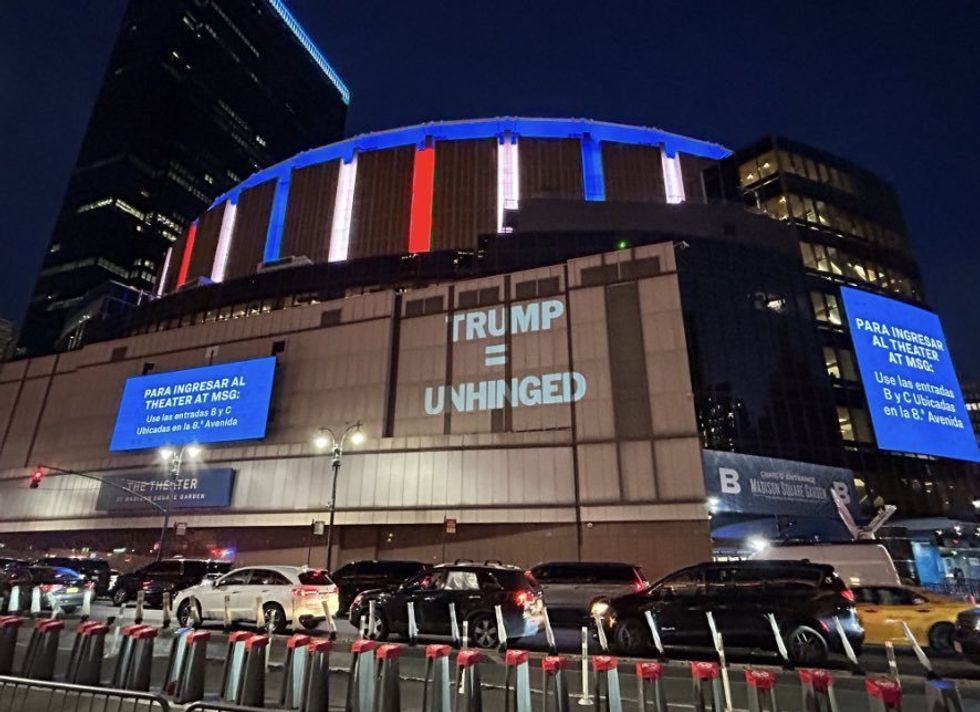 Projected message "Trump = Unhinged" on Madison Square Garden