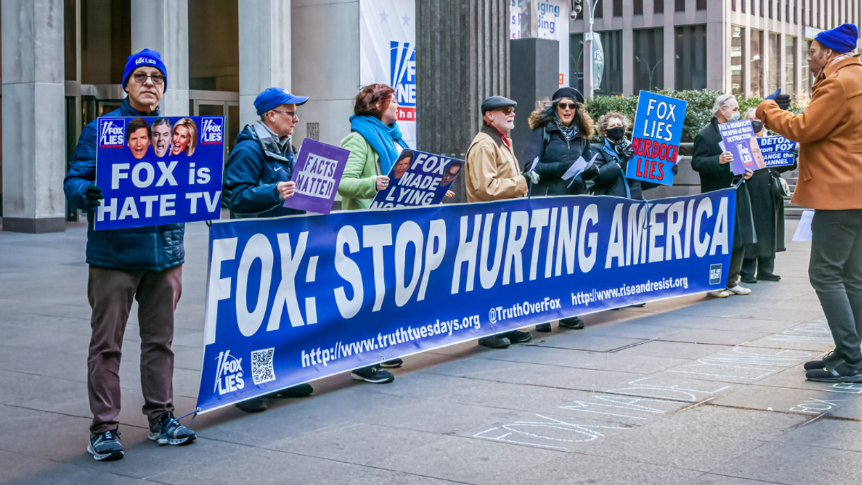 protesters gather at the weekly FOX LIES DEMOCRACY DIES event outside the NewsCorp Building in Manhattan