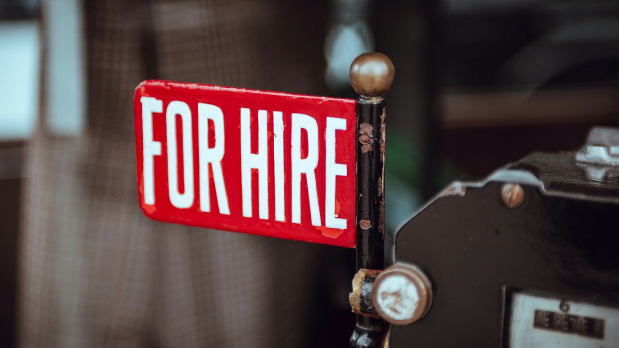 Red 'For Hire' sign