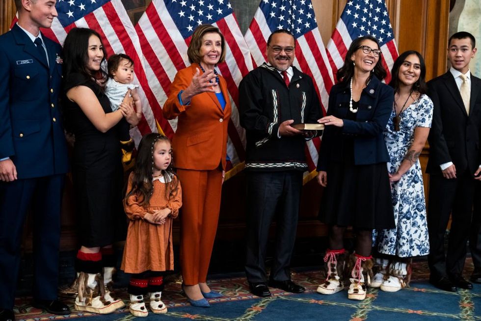 Rep. Mary Peltola, D-Alaska, third from right, along with her family, participates in a swearing-in ceremony with Speaker of the House Nancy Pelosi, D-Calif., in the U.S. Capitol on Tuesday, September 13, 2022.