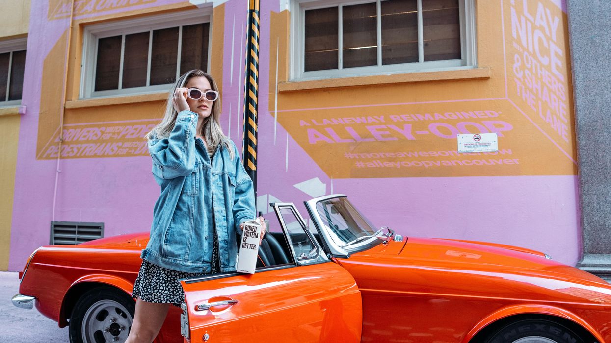 Rich woman with expensive car