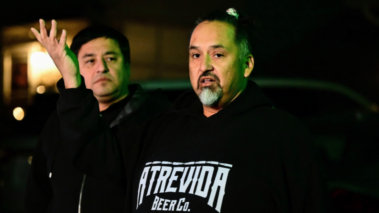 Richard Fierro with his brother Ed in the background