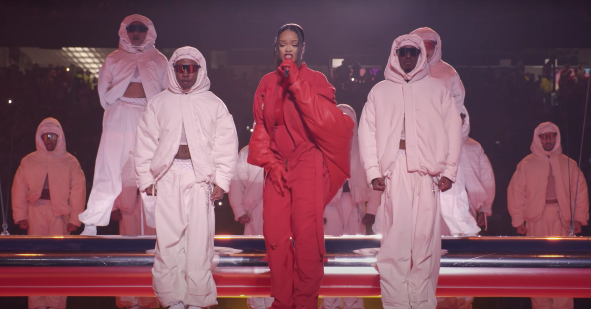 Rihanna performing with her backup dancers during Super Bowl LVII