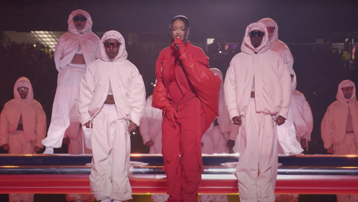 Rihanna performing with her backup dancers during Super Bowl LVII