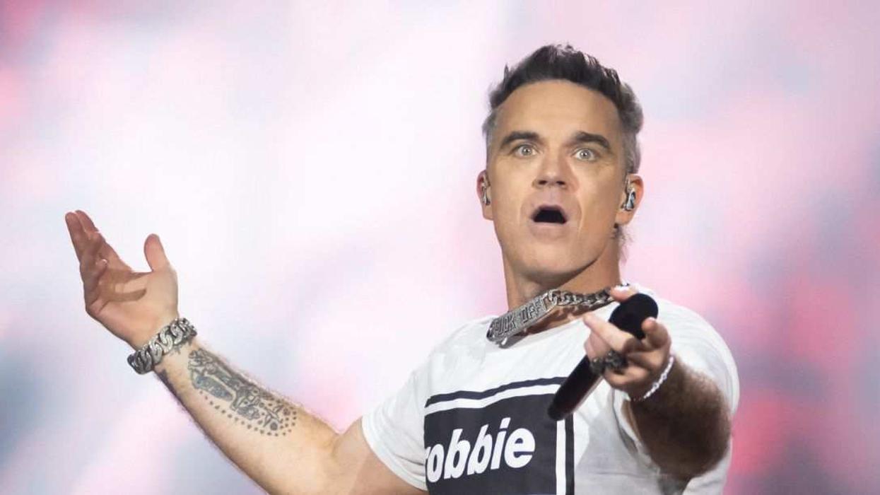 Robbie Williams performs live onstage during the Robbie Williams: Britpop tour.