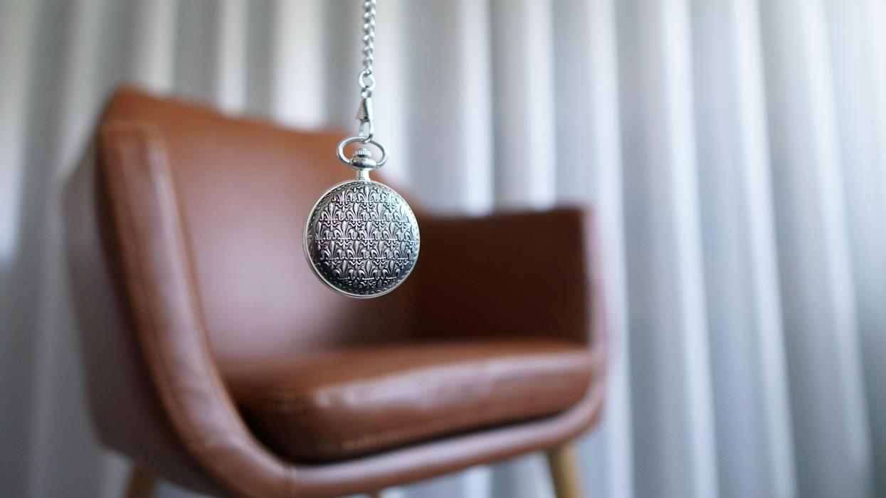 Round silver pendant used for hypnotism