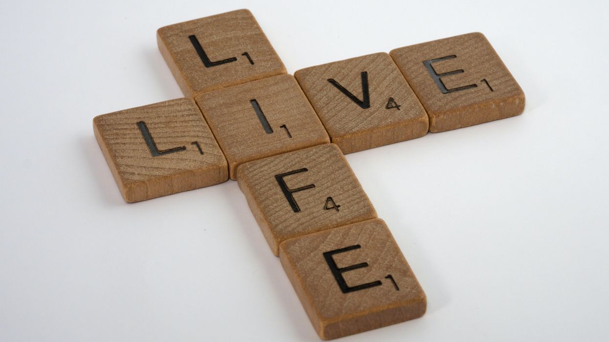 Scrabble tiles that read "Live Life"