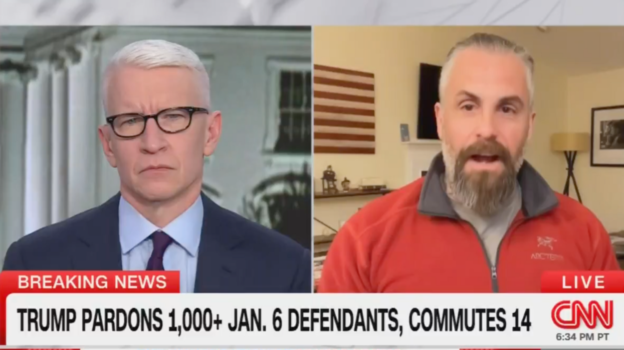 Screenshot of Anderson Cooper and Michael Fanone