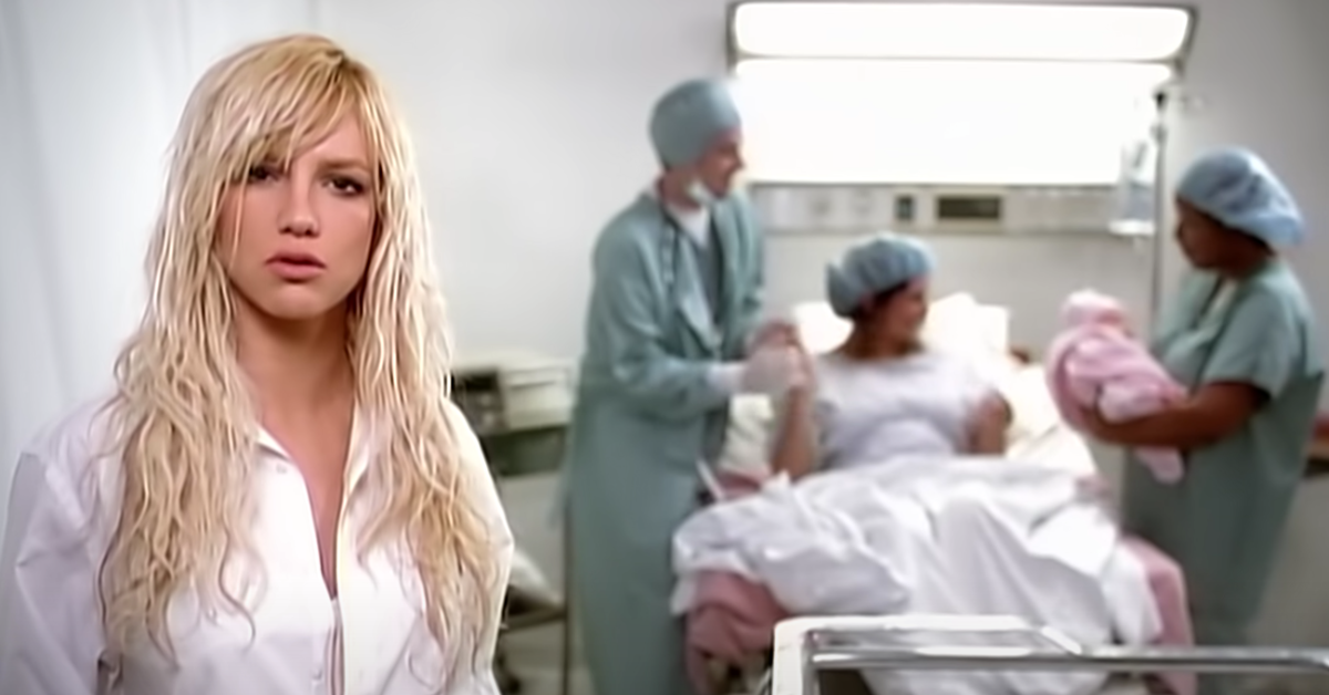 Screenshot of Britney Spears with woman in hospital giving birth from 'Everytime' music video