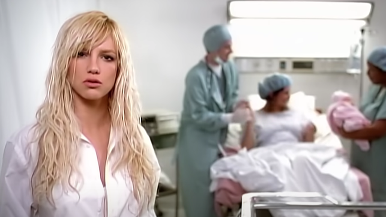 Screenshot of Britney Spears with woman in hospital giving birth from 'Everytime' music video