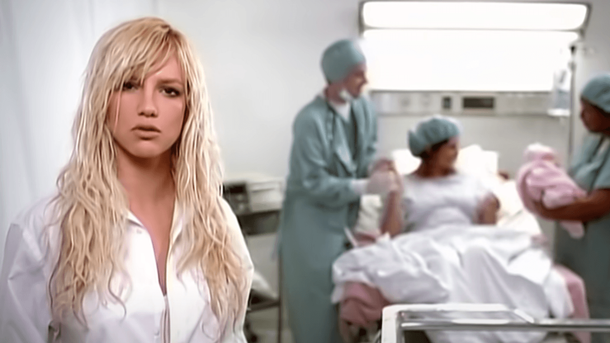 Screenshot of Britney Spears with woman in hospital giving birth from 'Everytime' music video