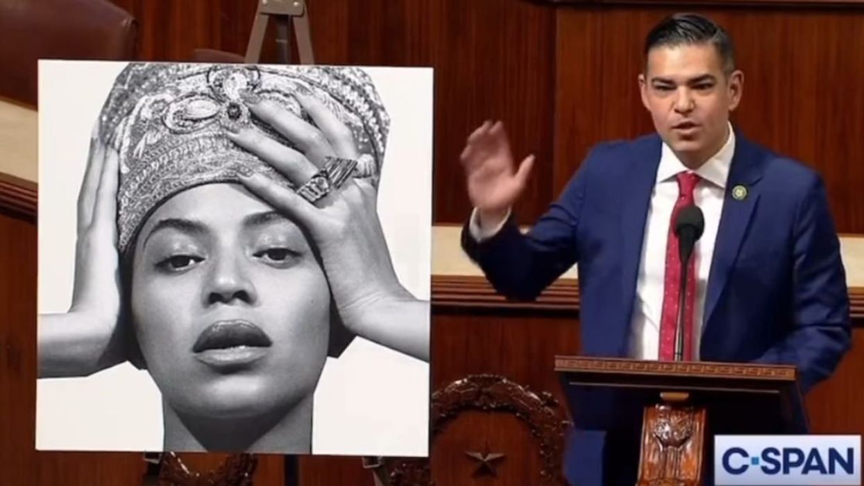 Screenshot of Congressman Robert Garcia with a placard of Beyoncé