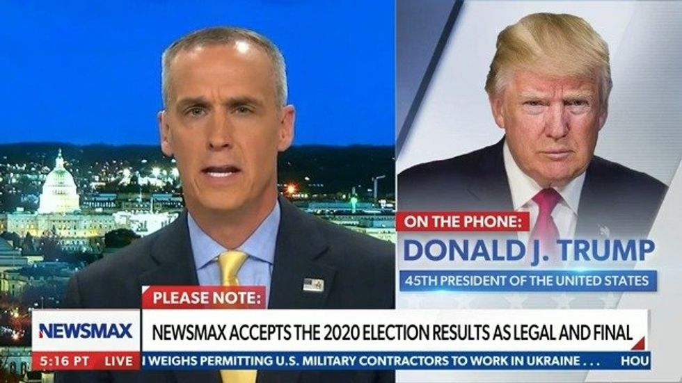 Screenshot of Corey Lewandowski speaking to Donald Trump by phone as Newsmax banner accepts 2020 election results