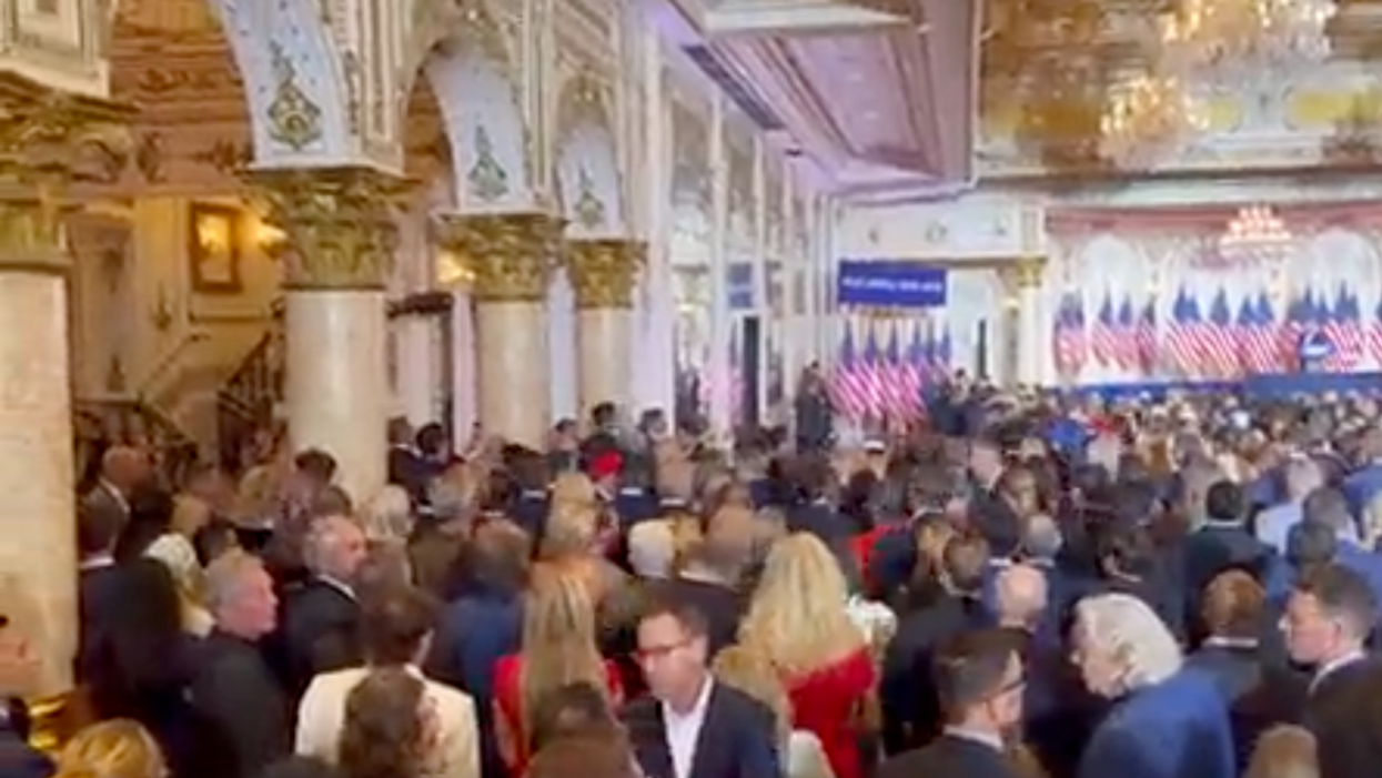 screenshot of crowd attempting to leave during Donald Trump's speech