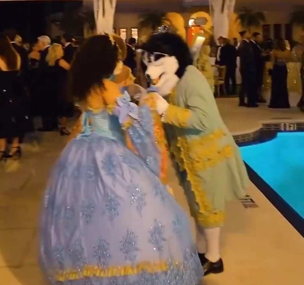 Screenshot of Mar-a-Lago attendees in dog costumes