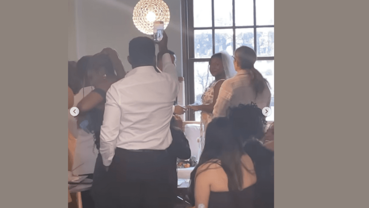 Screenshot of the couple getting married a the Mansion Society coffee shop