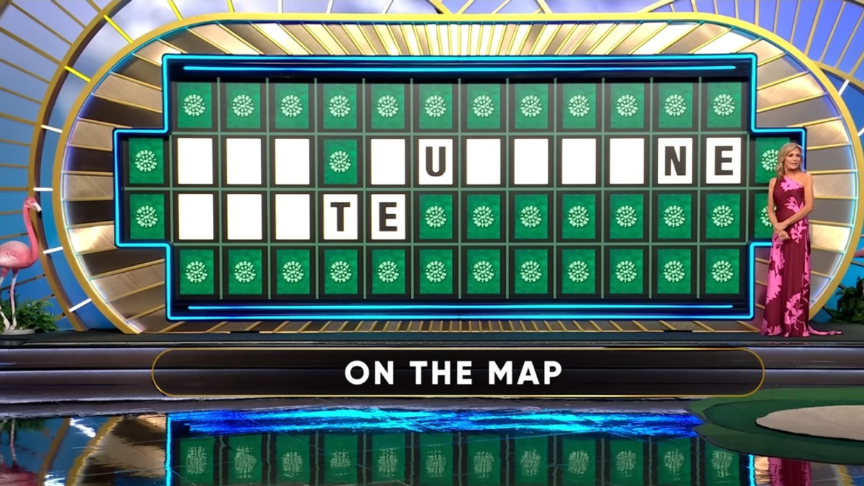 screenshot of Wheel of Fortune game board with Vanna White