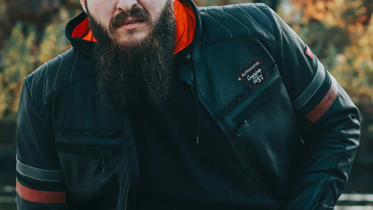 Shot of a middle-aged man looking into the camera a bit confused and disgusted.