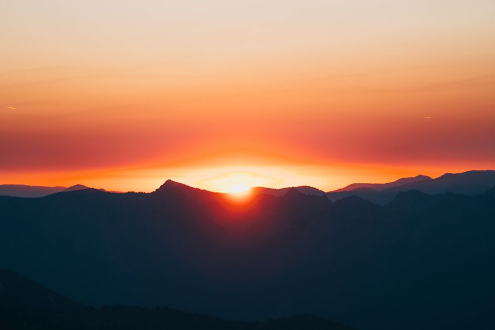 silhouette of mountains during golden hour