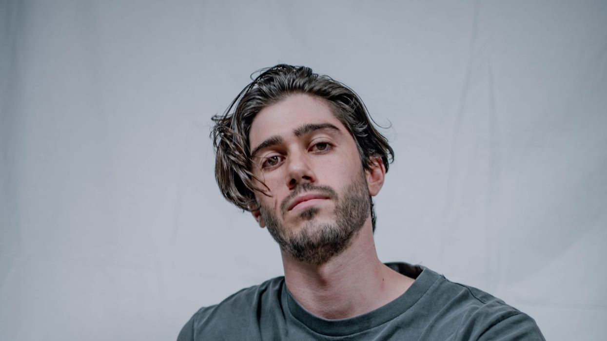 Single guy sitting in t-shirt