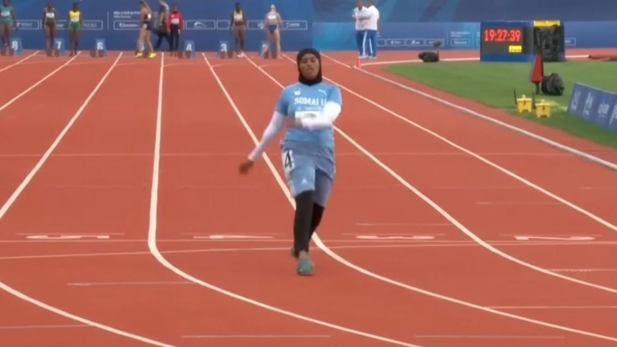 Somali Sprinter finishing last in 100-meter race
