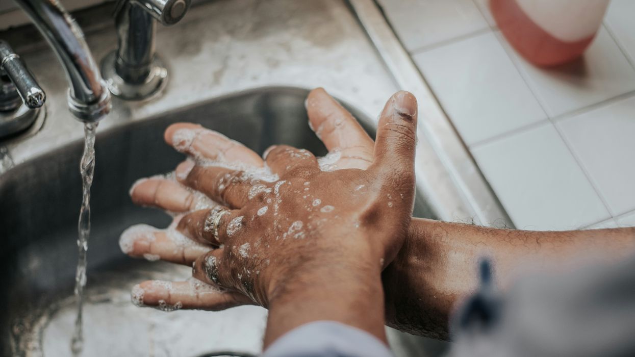 Someone washing their hands.