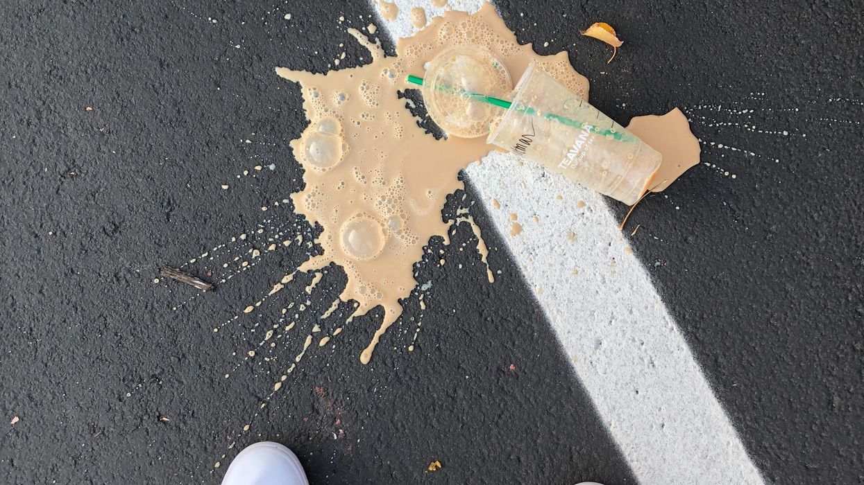 Splattered Teavana iced coffee on the pavement.
