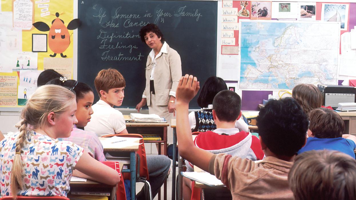 Teacher in front of classroom