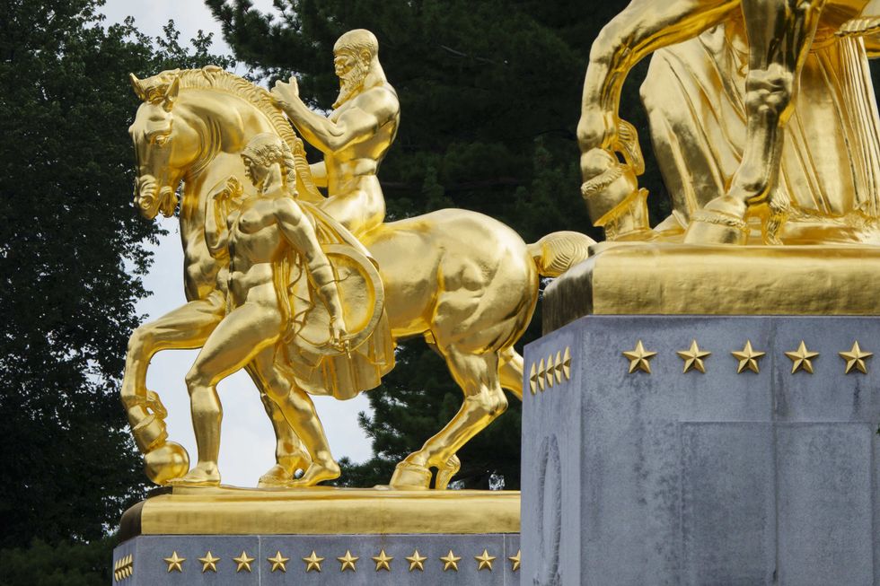 The Arts of War Valor gold-leaf-covered bronze statue located at the east end of the Arlington Memorial Bridge was part of a $5 million restoration and regilding project, seen on August 1, 2026 in Washington, DC.