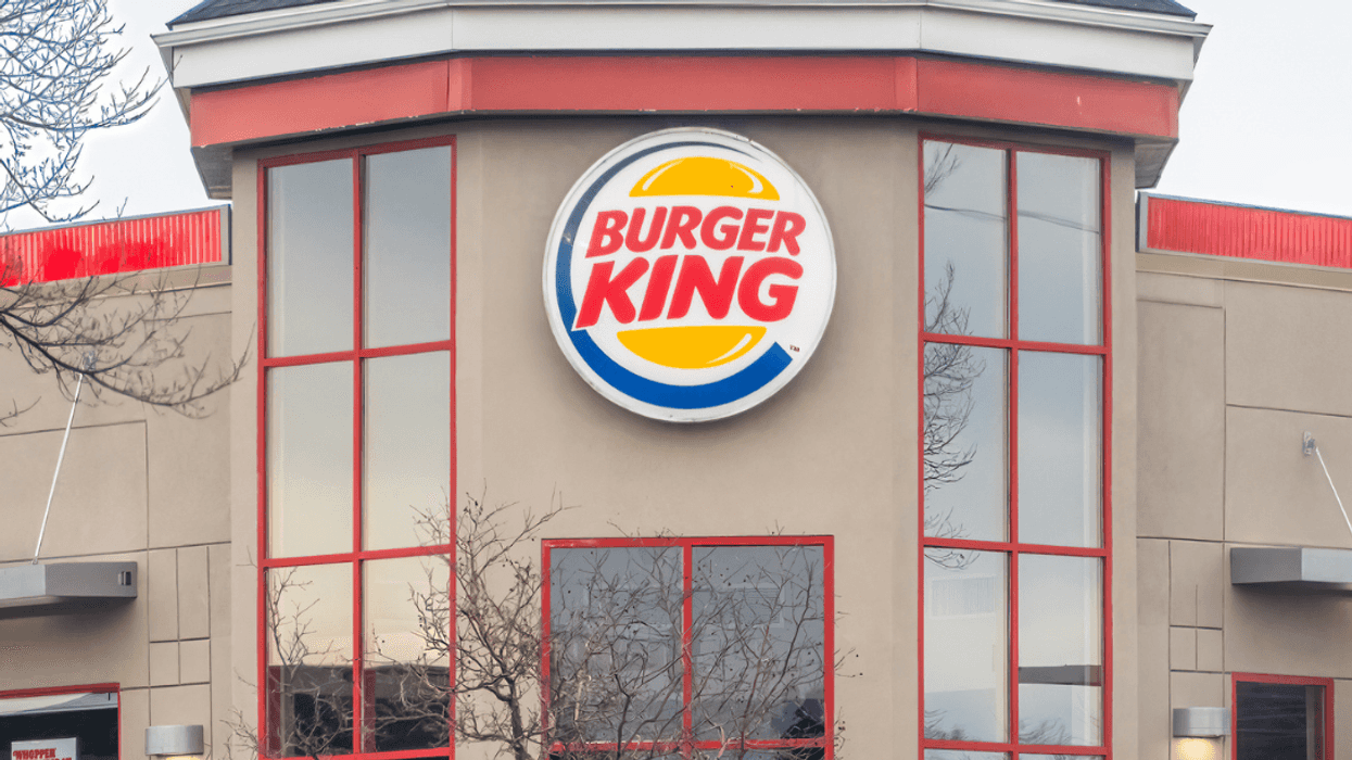 The exterior of a burger king.