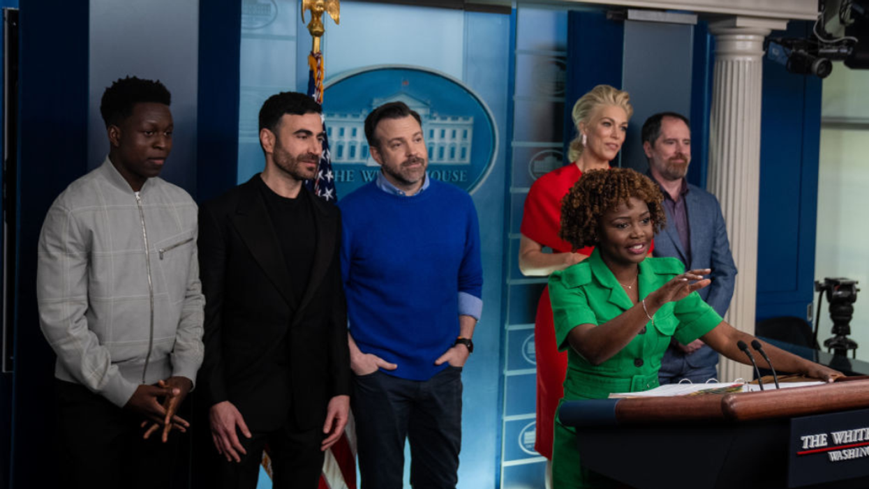 The "Ted Lasso" cast appears during a White House press briefing