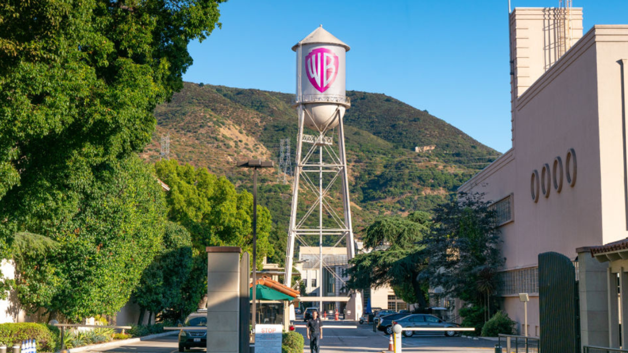 The Warner Bros. studio lot and iconic water tower with a pink logo to commemorate the "Barbie" movie